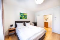Łóżko lub łóżka w pokoju w obiekcie Apartmenthaus Pastner am Teich