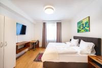Łóżko lub łóżka w pokoju w obiekcie Apartmenthaus Pastner am Teich