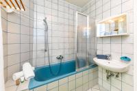 Łazienka w obiekcie Apartmenthaus Pastner am Teich