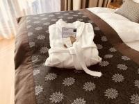 Łóżko lub łóżka w pokoju w obiekcie Apartmenthaus Pastner am Teich