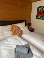 Łóżko lub łóżka w pokoju w obiekcie Apartmenthaus Pastner am Teich