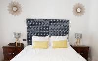 Posteľ alebo postele v izbe v ubytovaní La Villa Suite Málaga