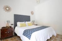 Posteľ alebo postele v izbe v ubytovaní La Villa Suite Málaga