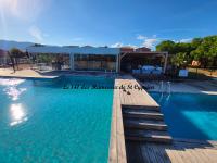 Bazén v ubytovaní Joli T2 climatisé au calme à 10 mm de Porto-Vecchio dans une résidence de tourisme alebo v jeho blízkosti