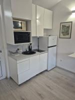 Kuchyňa alebo kuchynka v ubytovaní Vidučić Apartments