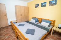 Postel nebo postele na pokoji v ubytování Aparmány Loučná nad Desnou