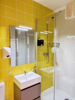A bathroom at Apartamentos Day Madrid ILDEFONSO Centro Gran Via Sol Malasaña