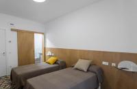 Posteľ alebo postele v izbe v ubytovaní Hostel.B