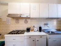 A kitchen or kitchenette at CASA MAFALDA - Rooms, friends and more - Affittacamere, Guest House