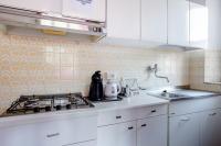 A kitchen or kitchenette at CASA MAFALDA - Rooms, friends and more - Affittacamere, Guest House