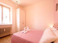 A bed or beds in a room at CASA MAFALDA - Rooms, friends and more - Affittacamere, Guest House