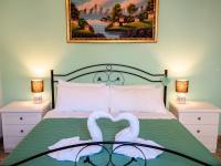 A bed or beds in a room at CASA MAFALDA - Rooms, friends and more - Affittacamere, Guest House