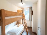 Łóżko lub łóżka w pokoju w obiekcie Alpensteinbock Saalbach D