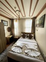 Postel nebo postele na pokoji v ubytování April Hotel