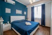Posteľ alebo postele v izbe v ubytovaní Maison Renée Viareggio