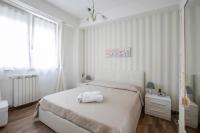 Posteľ alebo postele v izbe v ubytovaní Maison Renée Viareggio