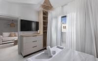 Ein Bett oder Betten in einem Zimmer der Unterkunft אורה דירות אירוח -נץ 9- דירות נופש איכותיות לנופש שקט ואקסלוסיבי