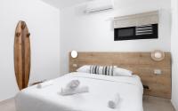 Ein Bett oder Betten in einem Zimmer der Unterkunft אורה דירות אירוח -נץ 9- דירות נופש איכותיות לנופש שקט ואקסלוסיבי