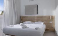 Ein Bett oder Betten in einem Zimmer der Unterkunft אורה דירות אירוח -נץ 9- דירות נופש איכותיות לנופש שקט ואקסלוסיבי