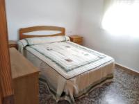 A bed or beds in a room at Friendly house with shared pool in Cartagena