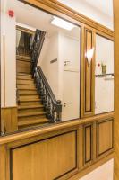 a view of a staircase from the hallway of a building at Hotel Agora Brussels Grand Place in Brussels