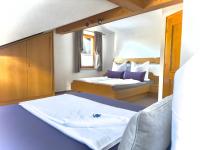 Łóżko lub łóżka w pokoju w obiekcie Ferienwohnung Vesna & Alex