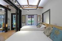 Ein Bett oder Betten in einem Zimmer der Unterkunft Jian Hanok