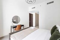 Postel nebo postele na pokoji v ubytování Silkhaus Chic 1BDR at Najmat Near Reem Central Park