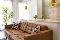 A seating area at Chinchilla Apartment in Malaga by Solaga Holiday Homes