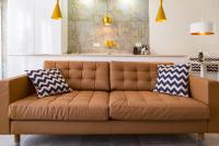 A seating area at Chinchilla Apartment in Malaga by Solaga Holiday Homes