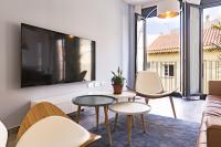 A television and/or entertainment centre at Chinchilla Apartment in Malaga by Solaga Holiday Homes