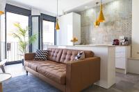 A seating area at Chinchilla Apartment in Malaga by Solaga Holiday Homes