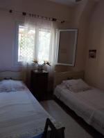Posteľ alebo postele v izbe v ubytovaní Stunning Evia Sea View Country House