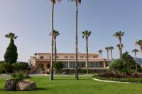 A garden outside Atlantica Thalassa Hotel
