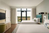 Ein Bett oder Betten in einem Zimmer der Unterkunft Hotel Effie Sandestin Resort, Autograph Collection