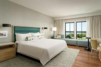 Ein Bett oder Betten in einem Zimmer der Unterkunft Hotel Effie Sandestin Resort, Autograph Collection