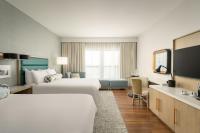 Ein Bett oder Betten in einem Zimmer der Unterkunft Hotel Effie Sandestin Resort, Autograph Collection