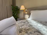 A bed or beds in a room at Casa al Lago