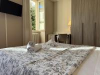 A bed or beds in a room at Casa al Lago