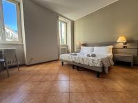 A bed or beds in a room at Casa al Lago