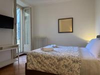 A bed or beds in a room at Casa al Lago