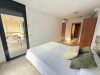 A bed or beds in a room at Agi Riera Ginjolers