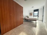 A bed or beds in a room at Agi Riera Ginjolers