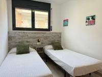 A bed or beds in a room at Agi Riera Ginjolers