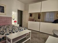 A bed or beds in a room at La Casa Dei Ricordi