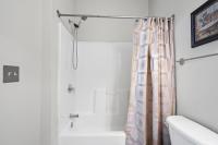 Ein Badezimmer in der Unterkunft World Tour Golf Resort 206
