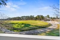 Ein Garten an der Unterkunft World Tour Golf Resort 206