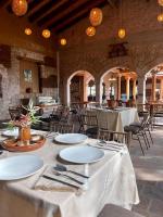 En restaurant eller et andet spisested på El Campirano Restaurante & Hotel