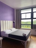 The Purple Tree Hostelにあるベッド