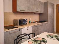 Kuchnia lub aneks kuchenny w obiekcie Apartament Izaaka
